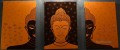 Buddha in orange in set panels